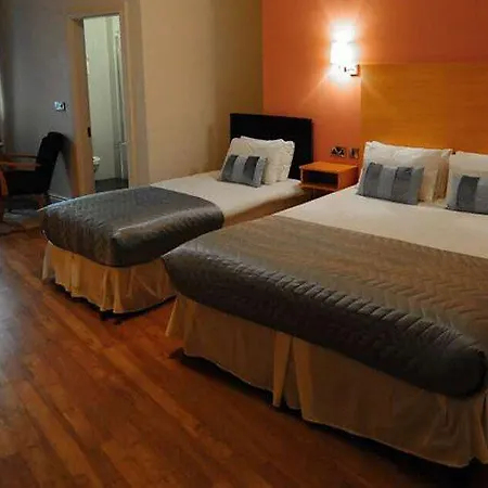 The Coach House فندق